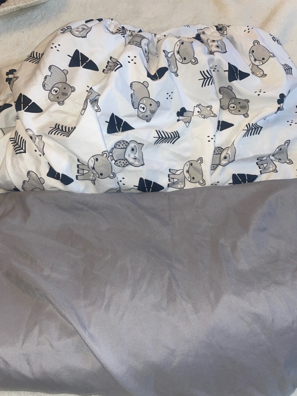 Two fitted crib sheets